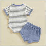 Flat lay of baby boy 2-piece soft waffle summer romper and shorts set infant outfit