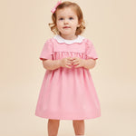 Baby girl spring princess dress featuring lovely tulip embroidery and smocked detailing.