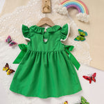 Flat lay of toddler girls green ruffle sleeve A-line party dress with bow detail