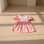Cute toddler girl tulip smocked dress with short sleeves and floral embroidery.