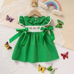 Toddler girl wearing green ruffle sleeve bow detail A-line party dress
