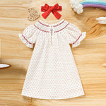 Cute toddler girls dress featuring heart embroidery and ruffle sleeves