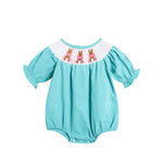 Turquoise Green short sleeve baby girl smocked romper with a white embroidered collar featuring three pink embroidered bunnies, displayed on a clean white background.